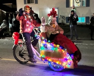 Mark Manzon piloting the Trishaw with passenger Brenda Hunt, also a CWALC pilot, during the Santa Claus Parade in Carleton Place